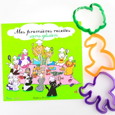 Kit du petit cuisto SANS GLUTEN Mes premières recettes de Delphine Dumont  Editions Plumes et Confettis Le livre de recette de cuisine illustré Mes premières recettes sans gluten est accompagné de 3 emporte-pièces à sablés vert, orange et violet.